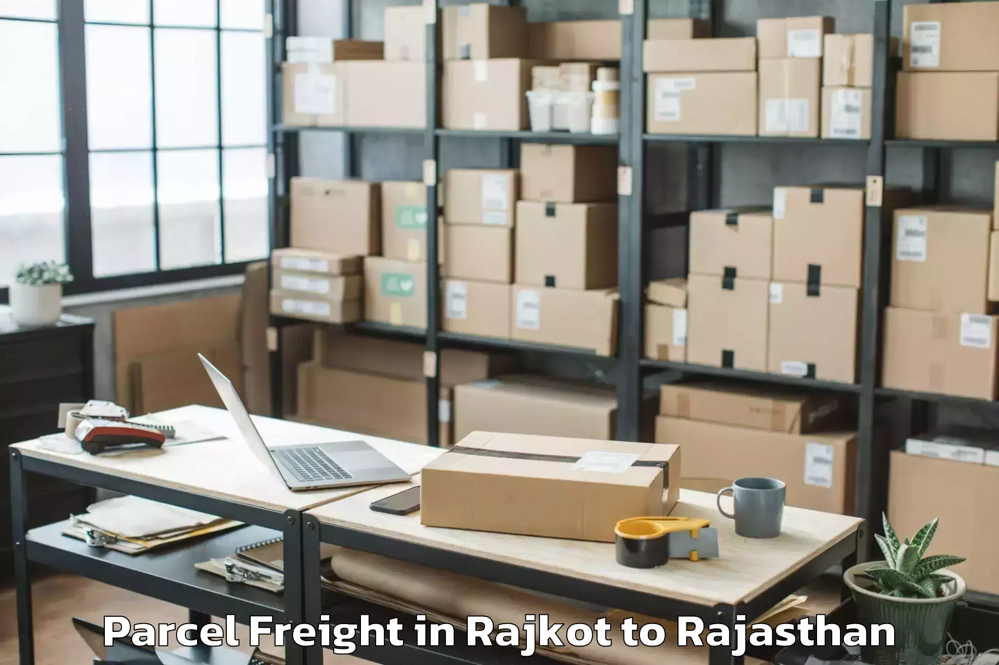 Affordable Rajkot to Swami Keshwanand Rajasthan Agr Parcel Freight